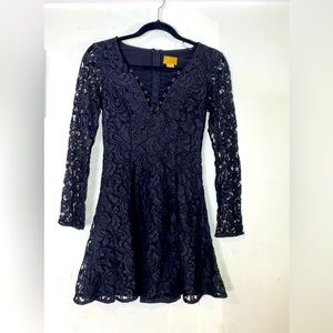 Black long sleeve Lacey dress with tie up. Little black dress